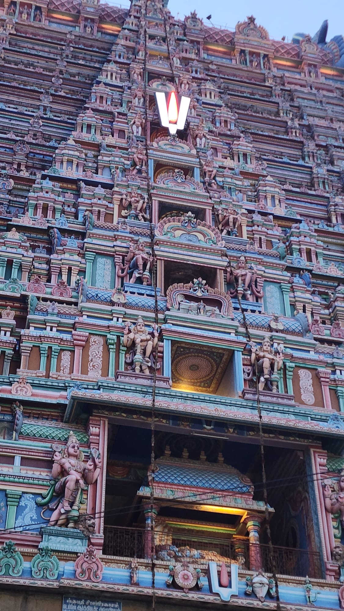 Colourful Hindu temple gopuram with detailed sculptures in India