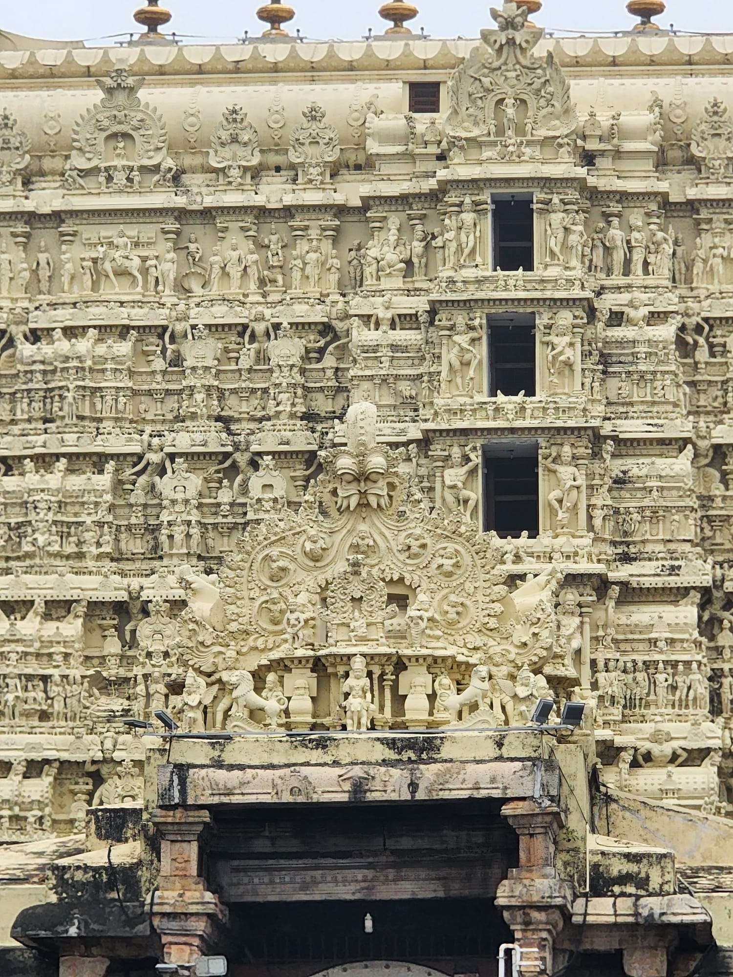 Ornate Hindu temple facade with carved figures in India