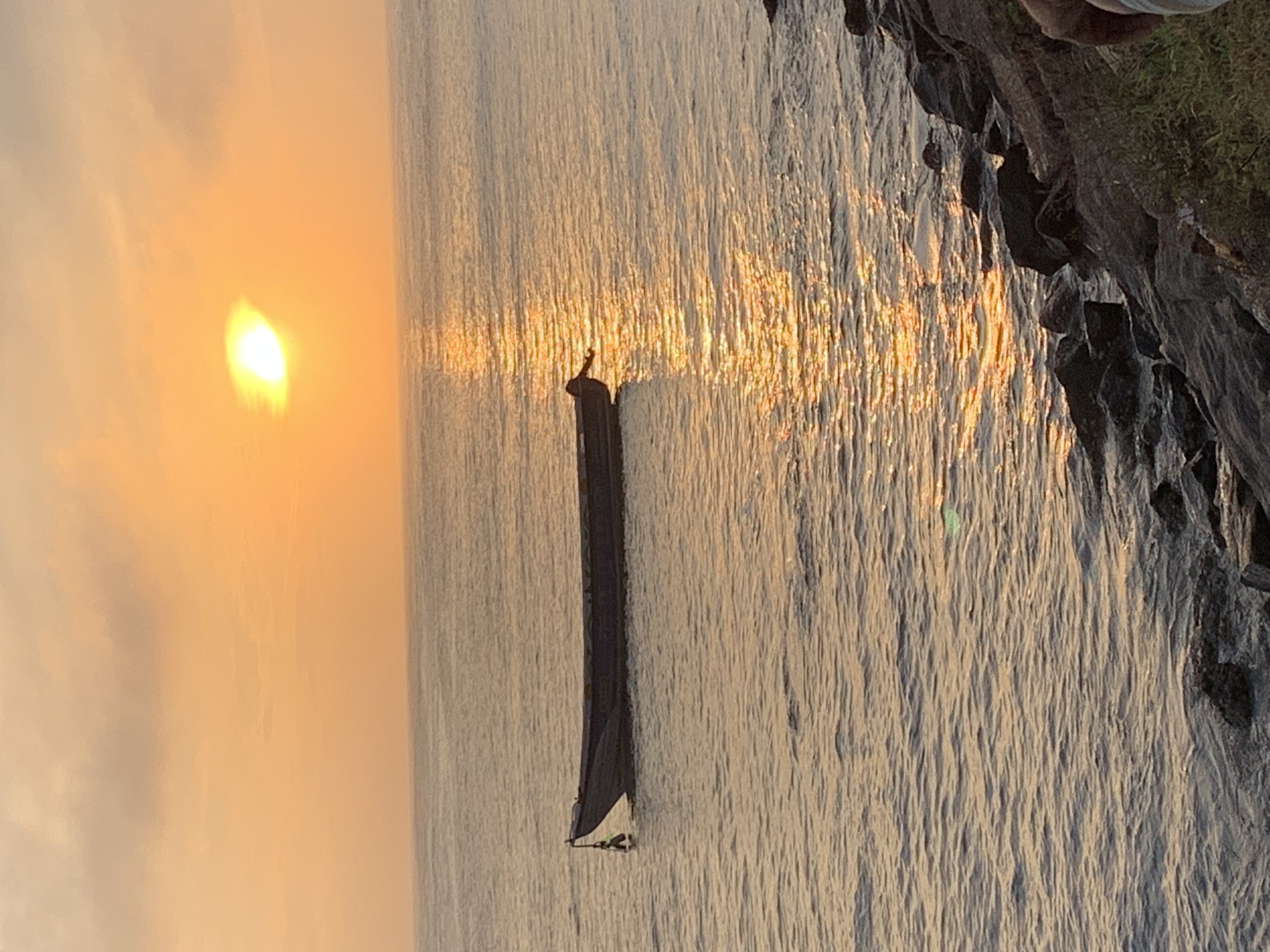 Wooden boat on the Indian coast at sunrise